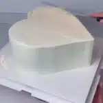 Colorful cake decorated with flowers and icing techniques for a celebration