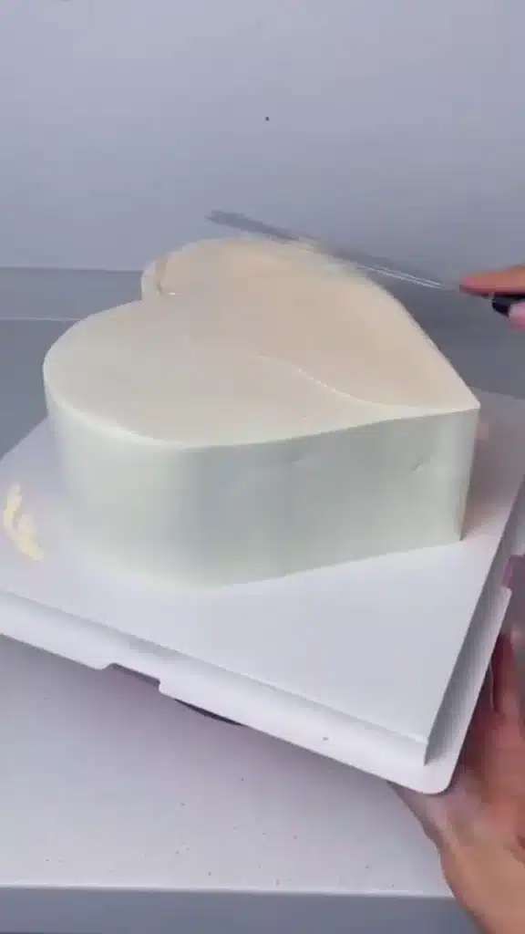 Colorful cake decorated with flowers and icing techniques for a celebration