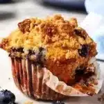 Freshly baked extra big blueberry muffins bursting with blueberries