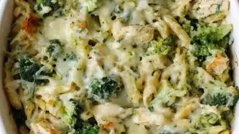 High Protein Alfredo Bake dish in a serving bowl garnished with parsley