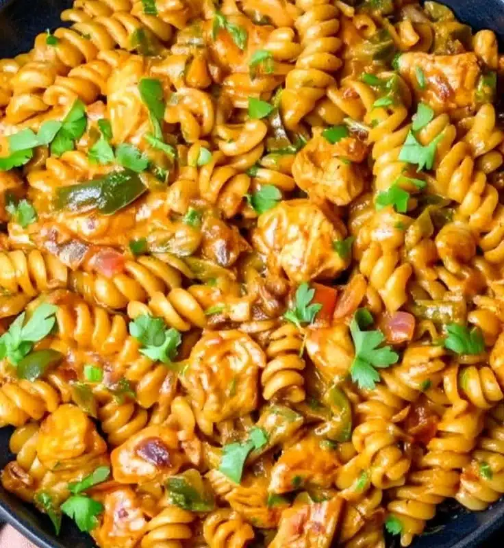 High protein chicken fajita pasta with colorful vegetables and flavorful spices