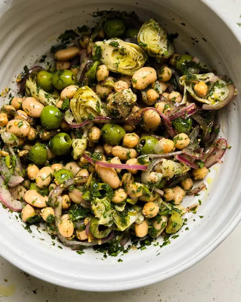 Delicious marinated Za'atar Bean Salad with fresh herbs and spices.