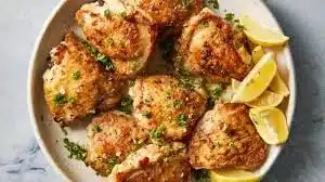 Delicious oven baked chicken thighs seasoned to perfection.