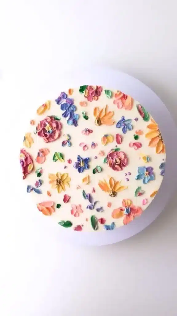 A beautifully decorated Sweetest Cake with vibrant frosting and fresh fruits.