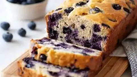 Freshly baked blueberry banana bread with blueberries on top