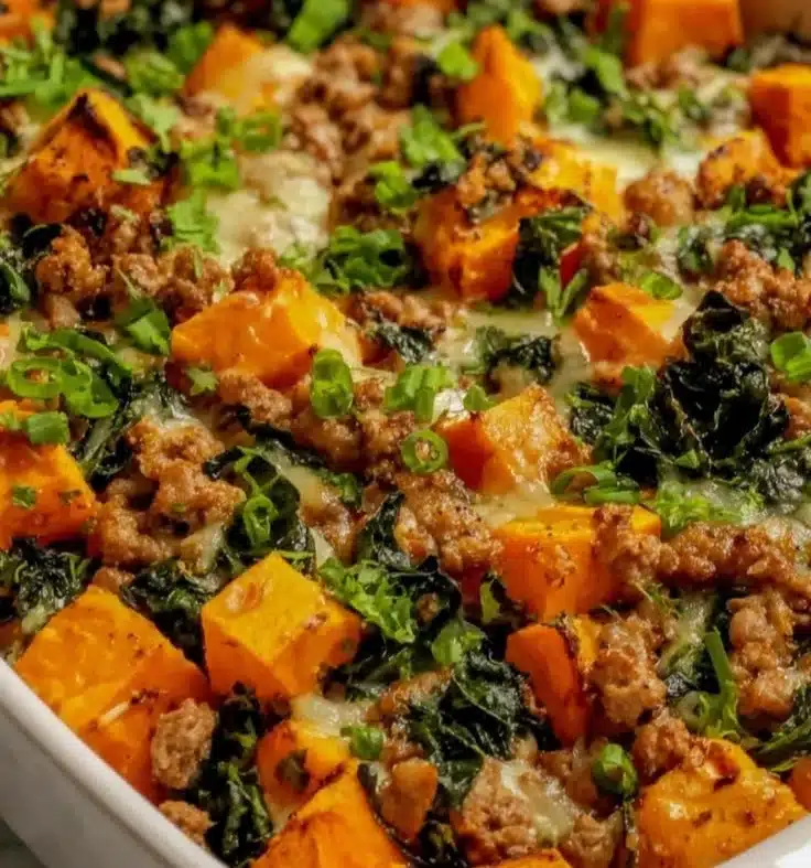 Ground Turkey Sweet Potato Bake topped with herbs and spices