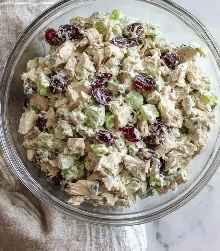 Healthy chicken salad with fresh vegetables and dressing
