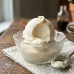 Bowl of homemade ice cream with various toppings and flavors