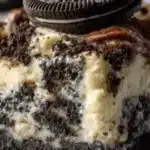 Delicious Oreo Dump Cake with crushed Oreos and creamy layers