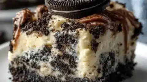 Delicious Oreo Dump Cake with crushed Oreos and creamy layers