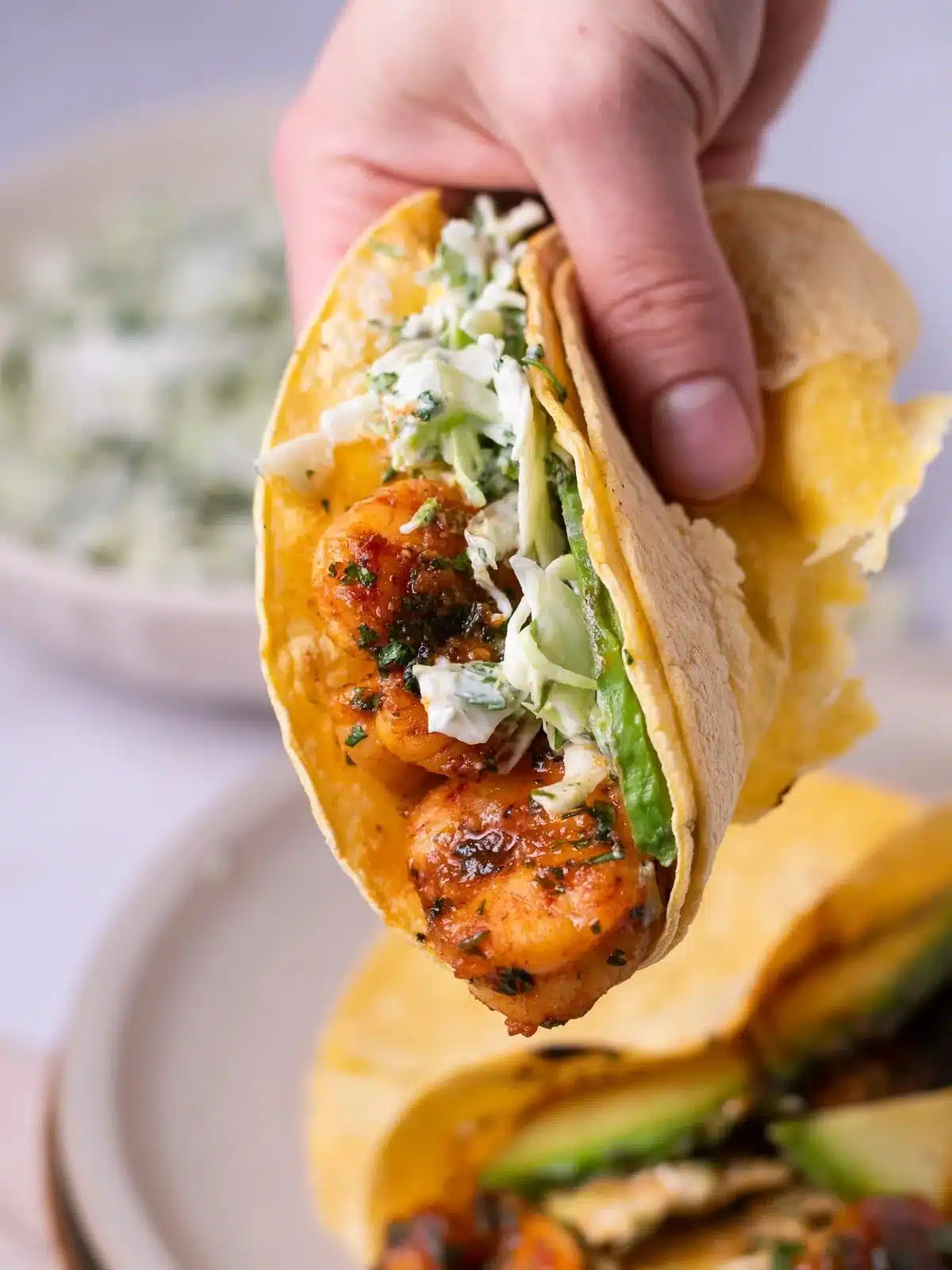 Cilantro Lime Shrimp Tacos topped with Creamy Slaw