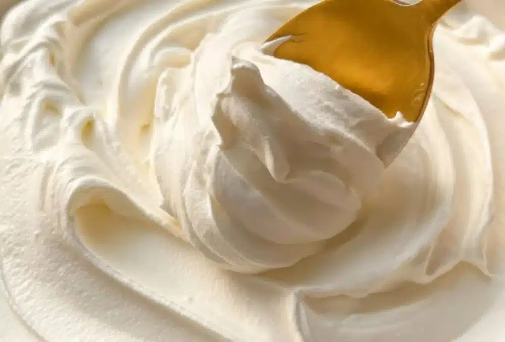 Homemade Cool Whip frosting toppings on cupcakes