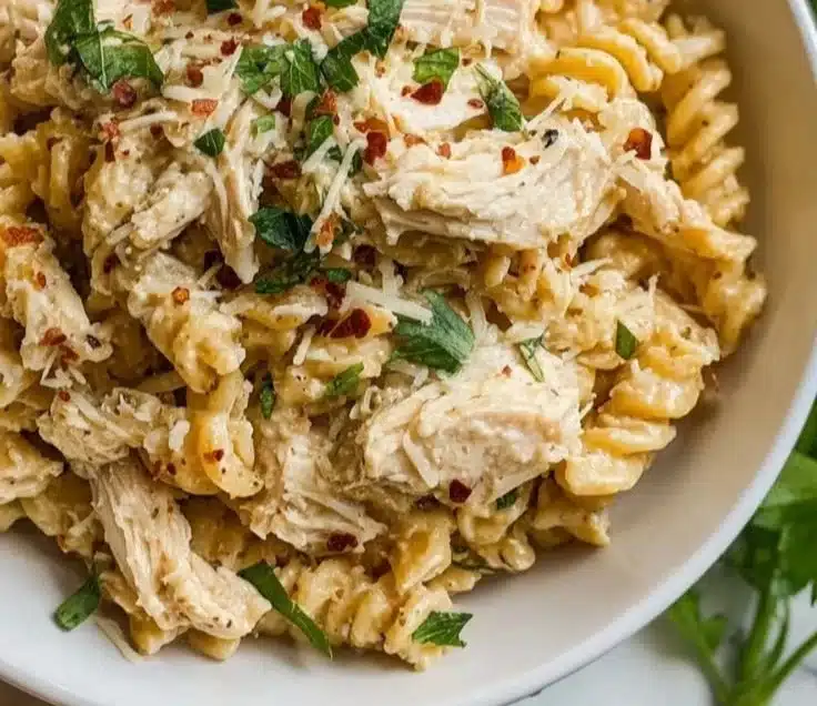 Delicious Garlic Parmesan Chicken Pasta with a creamy sauce and herbs