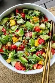 Colorful summer salads featuring fresh vegetables and fruits
