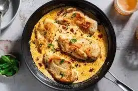 Fresh boneless skinless chicken breast ready for cooking.