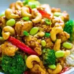 Delicious Chinese Cashew Chicken with cashews, vegetables, and savory sauce.