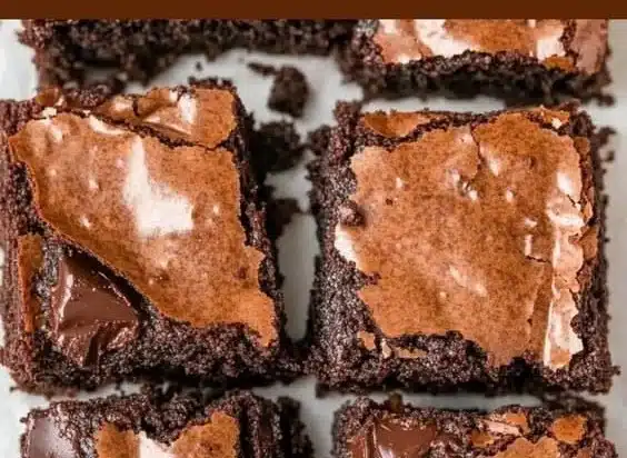 Delicious homemade chocolate brownies on a plate with a rich, fudgy texture
