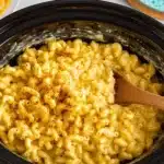 Creamy Crockpot Mac and Cheese served in a bowl with garnishes