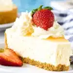 A delicious slice of easy no bake cheesecake topped with fresh berries
