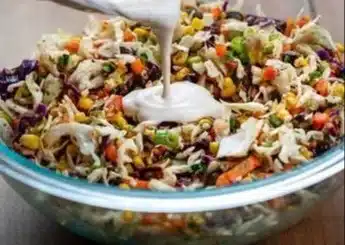 Delicious bowl of Frito Cowboy Cabbage with colorful ingredients and Fritos
