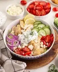 Delicious Greek Chicken Gyro bowl with chicken, vegetables, and sauce
