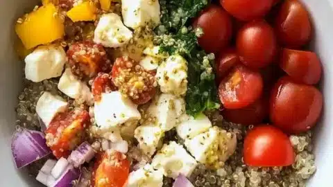 Mediterranean Quinoa Power Bowl with fresh vegetables and herbs