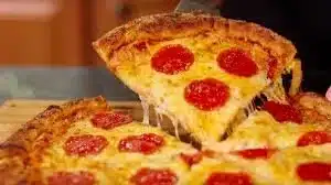 Delicious Pizza Grilled Cheese sandwich with melted cheese and pizza toppings
