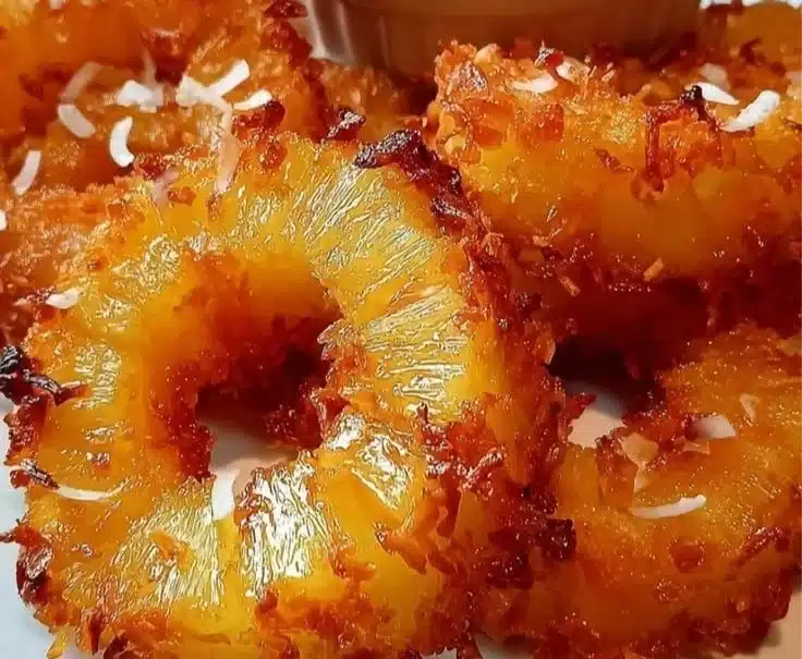 Delicious rum-soaked dessert featuring rich flavors and sweet indulgence.