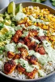 Delicious Street Corn Chicken Rice Bowl topped with fresh ingredients