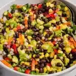 Black Bean and Corn Pasta Salad with Lime Greek Yogurt Dressing served in a bowl