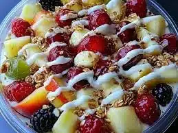 Caramel Crunch Cheesecake Fruit Salad with fresh fruit and caramel topping