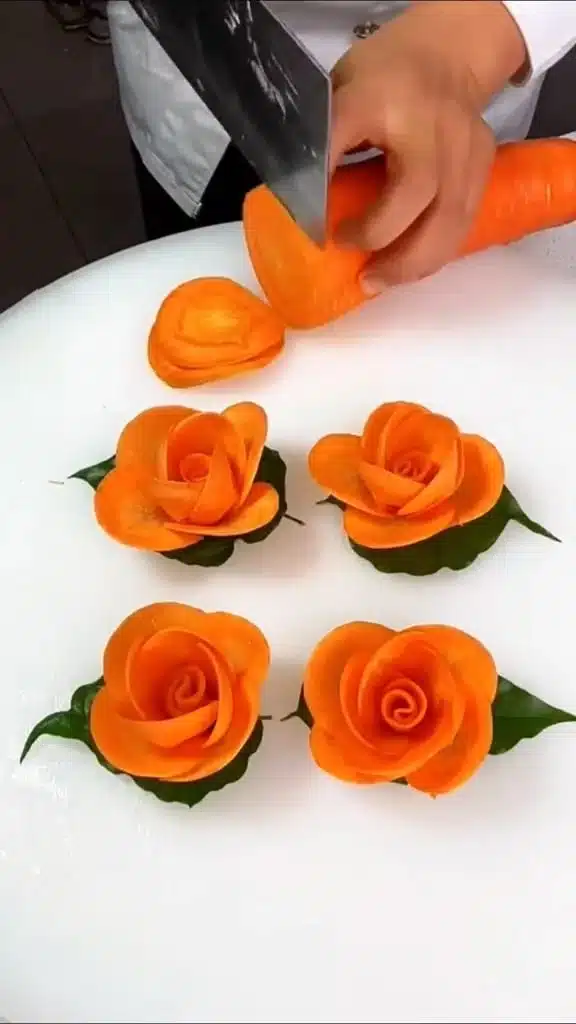Beautiful carrot flowers blooming in a vegetable garden.
