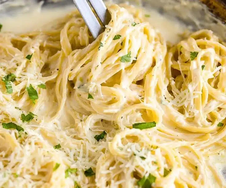 Creamy homemade Alfredo sauce inspired by Olive Garden's recipe