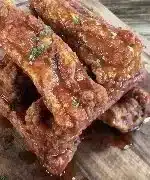 Crispy deep-fried spare ribs served on a platter