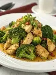 Delicious chicken broccoli dish garnished and ready to serve