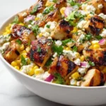 High protein chicken salad with street corn, a flavorful and healthy dish.