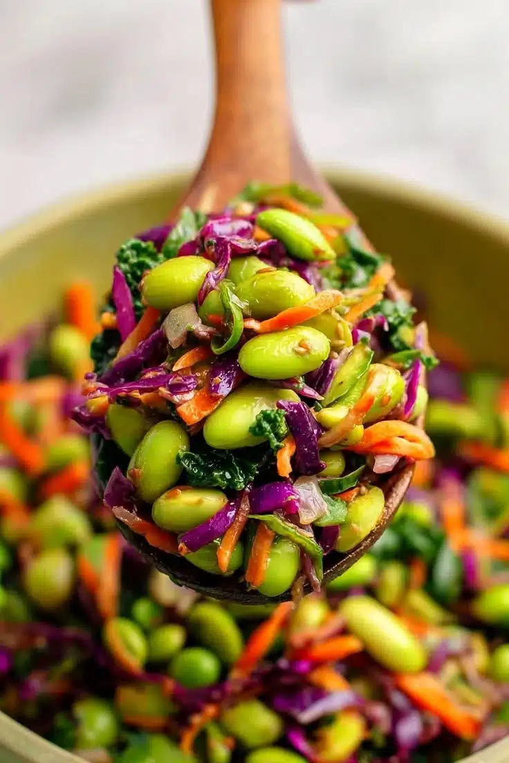 Colorful homemade edamame salad with fresh vegetables and dressing