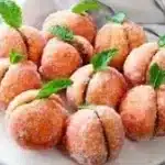 Delicious Italian Peach Cookies arranged on a plate