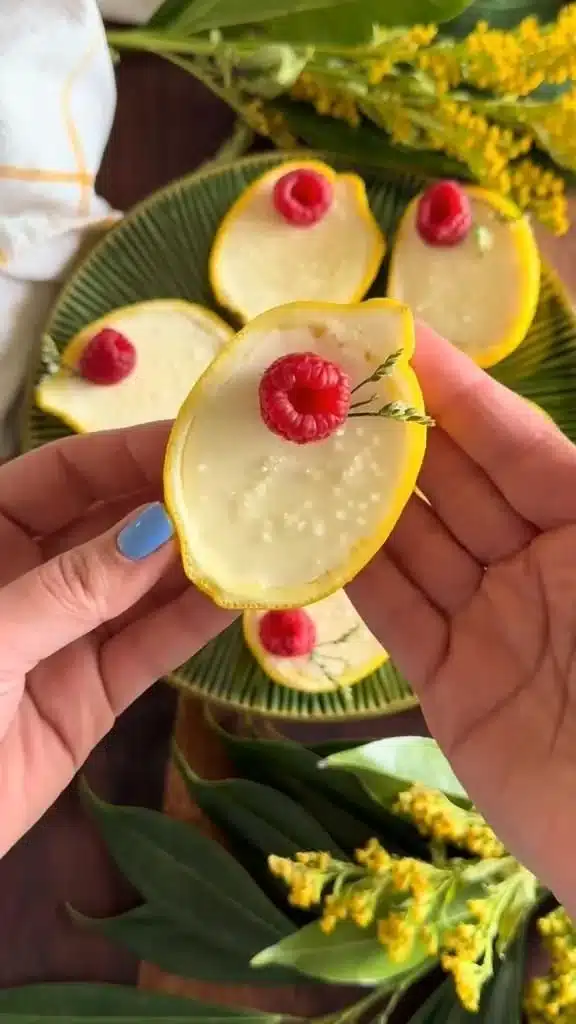 Creamy Lemon Posset dessert served in a glass, garnished with a lemon zest.