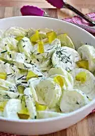 Fresh Pickle Juice Ranch Cucumber Salad with dressing in a bowl