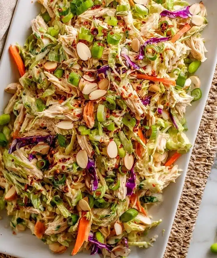 Quinoa rotisserie chicken salad with fresh veggies and herbs