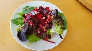 Ruby Red Beet Salad with fresh greens and vinaigrette dressing
