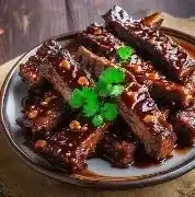 Delicious sweet and sour spareribs served on a plate