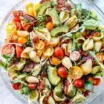 Bowl of fresh BLT Pasta Salad with bacon, lettuce, and tomatoes