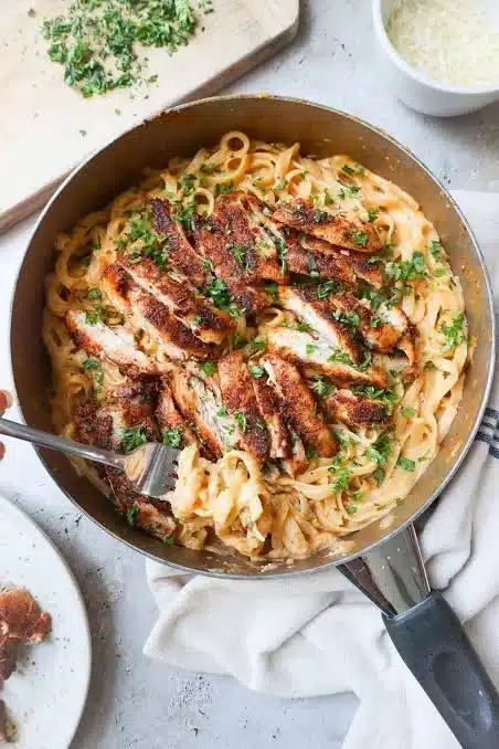 Delicious Cajun Chicken Pasta with colorful ingredients and spices