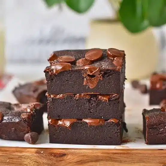 Batch of healthy cottage cheese brownies on a cutting board