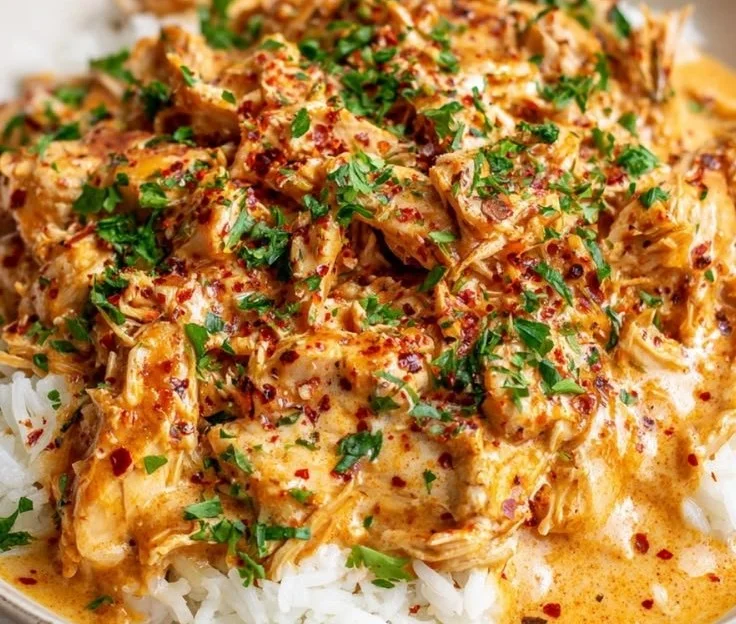 Creamy Crockpot Cajun Butter Chicken recipe with rich flavors and spices.