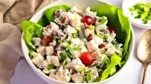 Delicious Greek yogurt chicken salad served in a bowl with fresh ingredients