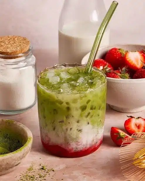 Delicious Iced Matcha Latte with vibrant green color served in a glass