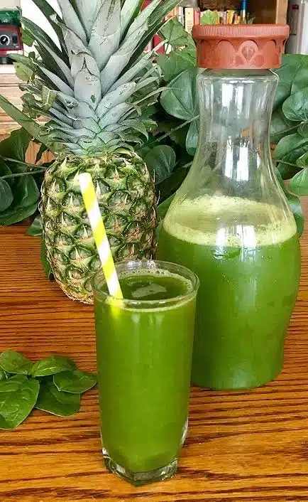 Refreshing Pineapple Fresh Water served in a glass with tropical garnishes.
